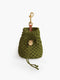 An olive green hand-knotted macramé rope poop and treats bag from Manifattura VALOR featuring matching drawstring ties and a circular gold monogram charm.