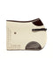 Cream wool felt cut-out saddle pad with dark brown calf nappa leather trim, adjustable fastening strap shown