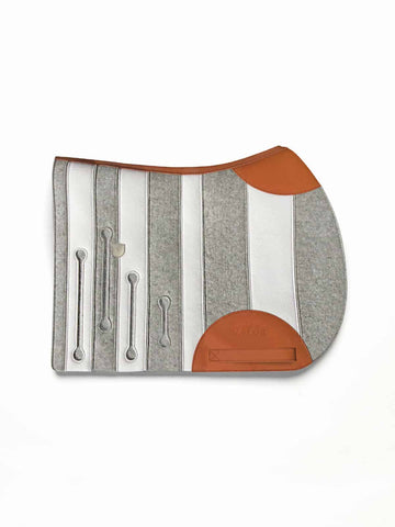 Horse saddle pad with grey and white felt stripes and tan leather reinforcement displayed on a white background.