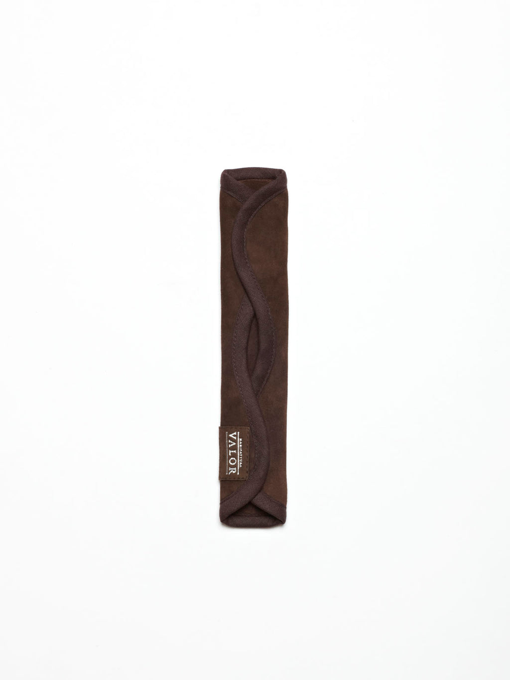 A brown fabric strap cover with a VALOR brand label against a plain white background.
