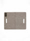 Foldaway handcrafted Italian VALOR wool felt dog mat, grey, flat lay showing handle slits and brand tag detail