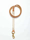 A tan leather horse lead rein with a white hand-knotted rope section and a heavy-duty gold snap hook.
