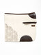 Horse saddle pad by STERZING, natural white tone, brown leather accents, fitted with straps.