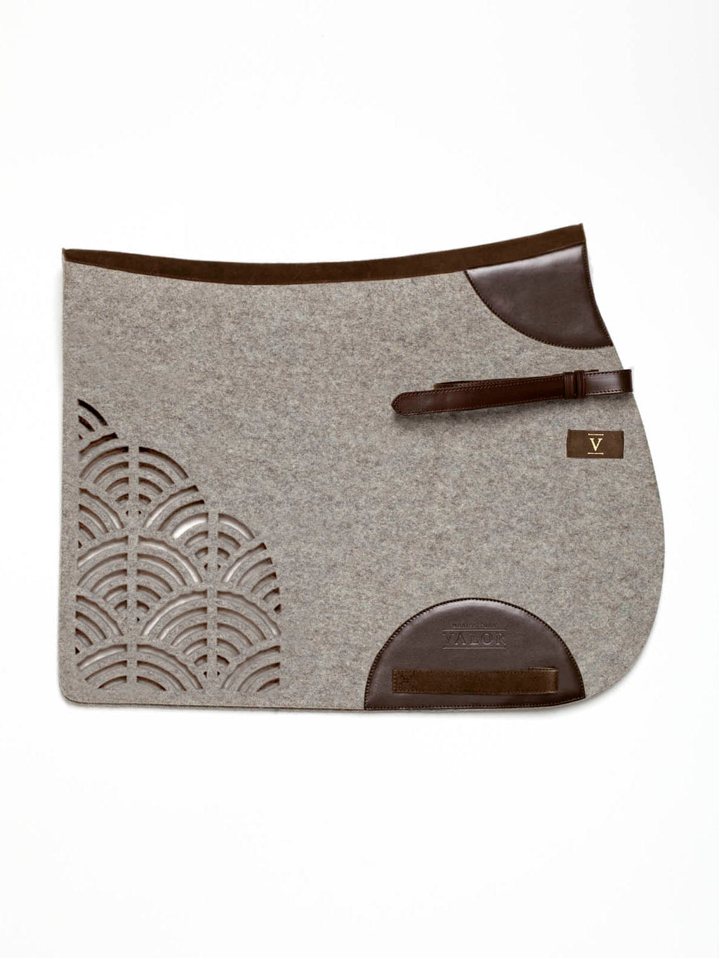 Grey wool felt horse saddle pad with dark brown leather trim and a decorative laser-cut fan pattern by Manifattura Valor.