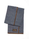 Folded blue herringbone wool horse blanket with brown trim and VALOR brand patch.