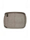 Top view of Manifattura Valor rollable dog bed in grey wool felt, showing brand label and leather side straps.
