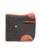 A side-view image of a dark grey felt horse saddle pad with bright tan leather wear leathers and trim, featuring a decorative laser-cut triangle pattern on the back, isolated on a white background.