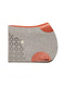 Light grey wool felt saddle pad with tan leather wear patches and a triangular side-perforation pattern.